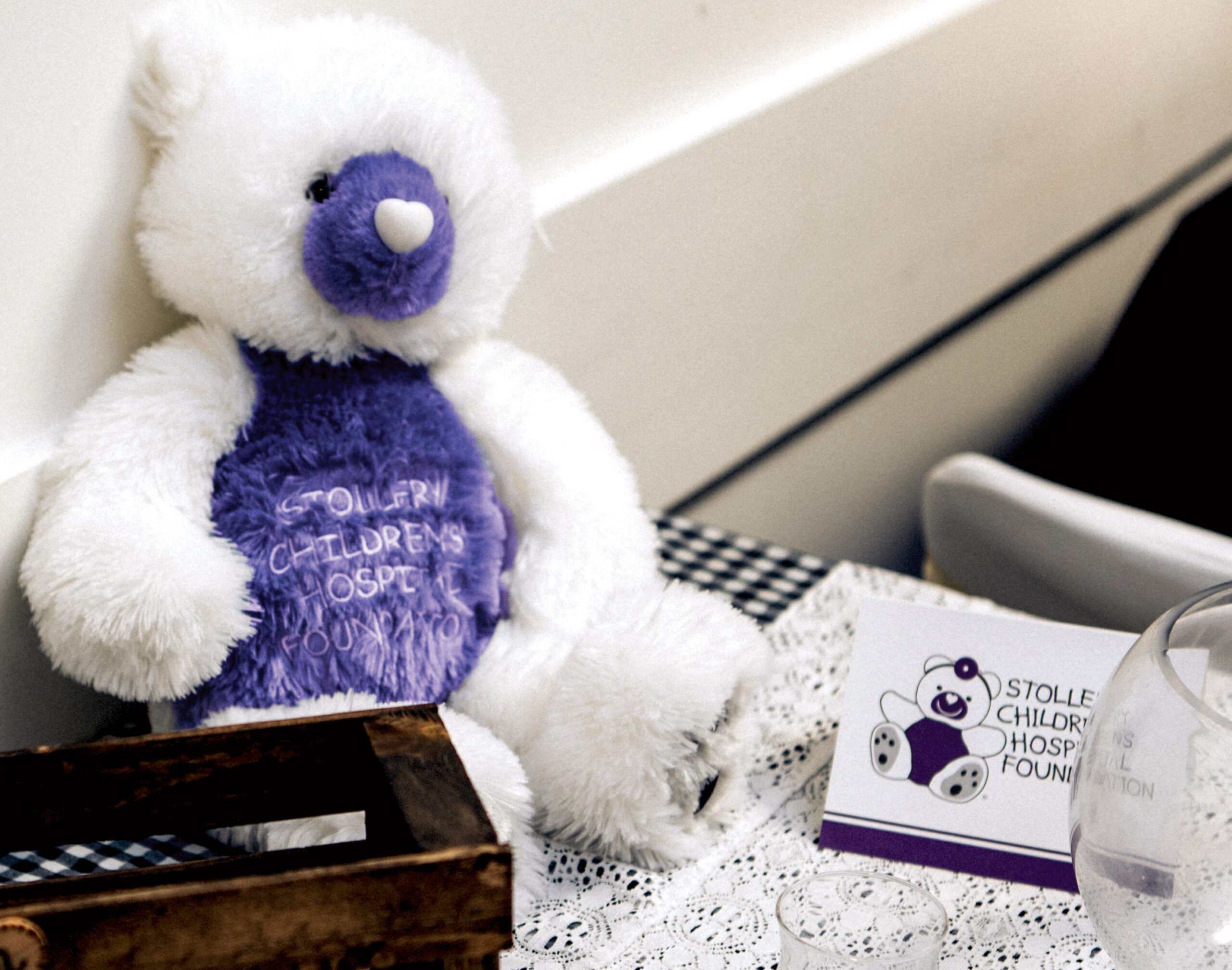 stollery bear on wedding table with cards